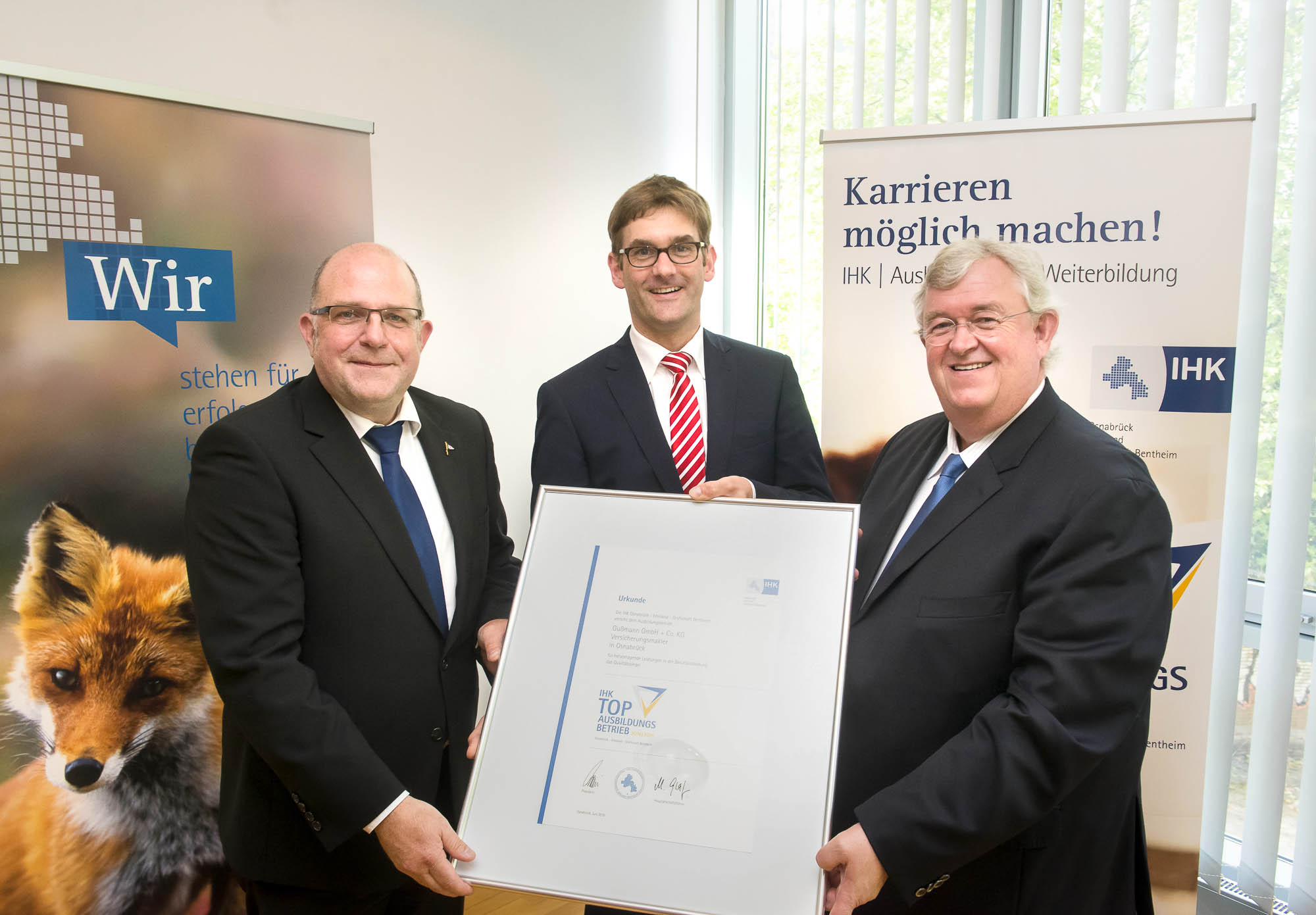 Martin Schlichter, IHK President, Bodo Gußmann and Jörg Holtgrefe, Gußmann GmbH + Co. KG (from right).